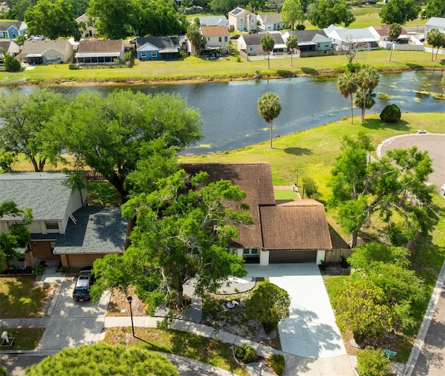4520 Wescott Ln, Tampa, FL 33624 - drone / aerial view featuring a water view and a residential view