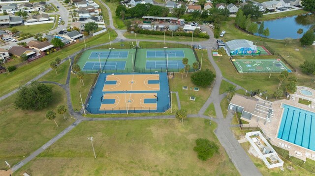 4520 Wescott Ln, Tampa, FL 33624 - drone / aerial view featuring a water view and a residential view