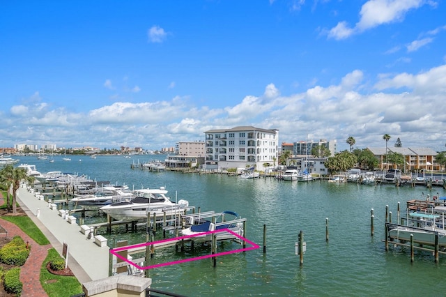 dock area with a water view and boat lift