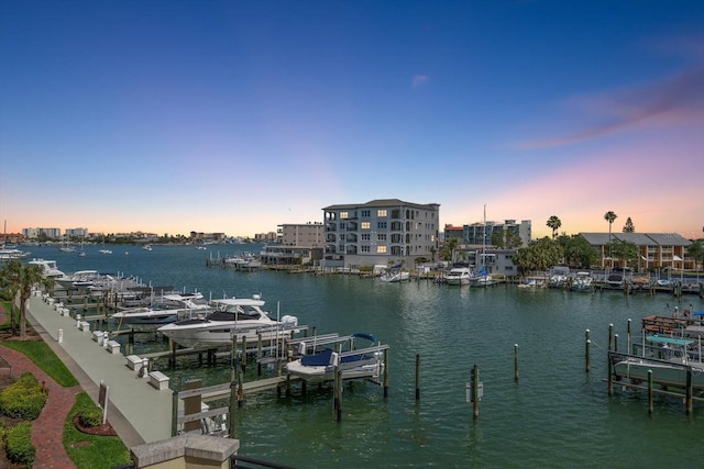 202 Windward Psge Unit 304, Clearwater Beach, FL 33767 - dock with a water view and boat lift