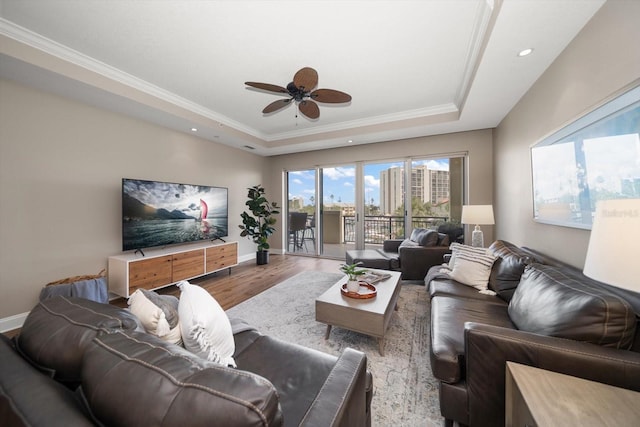 202 Windward Psge Unit 304, Clearwater Beach, FL 33767 - living room with a raised ceiling, a ceiling fan, wood finished floors, ornamental molding, and recessed lighting