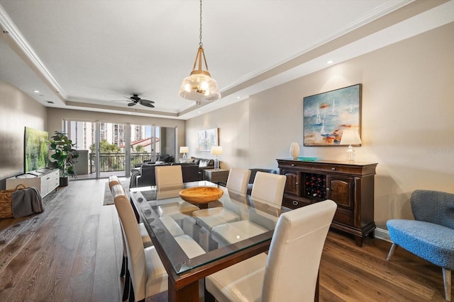 202 Windward Psge Unit 304, Clearwater Beach, FL 33767 - dining area featuring a raised ceiling, wood finished floors, a ceiling fan, and recessed lighting