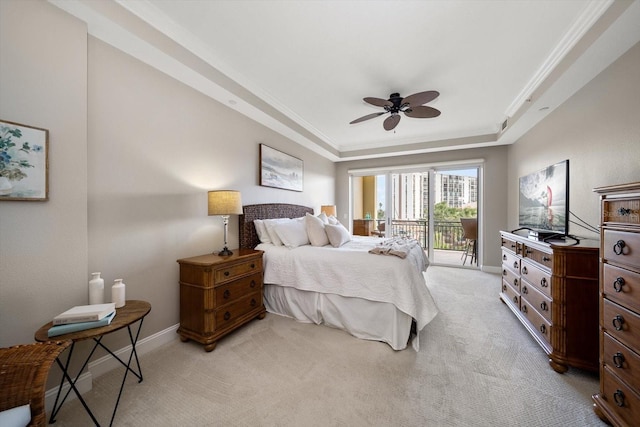 202 Windward Psge Unit 304, Clearwater Beach, FL 33767 - bedroom featuring a raised ceiling, access to exterior, light carpet, ornamental molding, and ceiling fan
