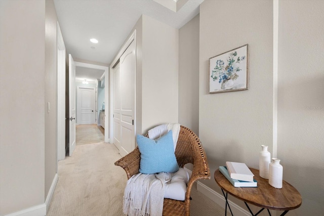 202 Windward Psge Unit 304, Clearwater Beach, FL 33767 - living area featuring light colored carpet and baseboards