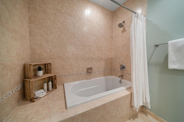 202 Windward Psge Unit 304, Clearwater Beach, FL 33767 - bathroom featuring tiled shower / bath combo