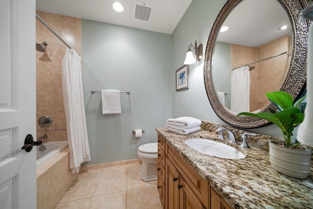 202 Windward Psge Unit 304, Clearwater Beach, FL 33767 - bathroom featuring vanity, tile patterned floors, tiled shower / bath combo, and recessed lighting