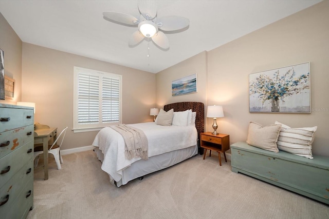 202 Windward Psge Unit 304, Clearwater Beach, FL 33767 - bedroom with light carpet and ceiling fan