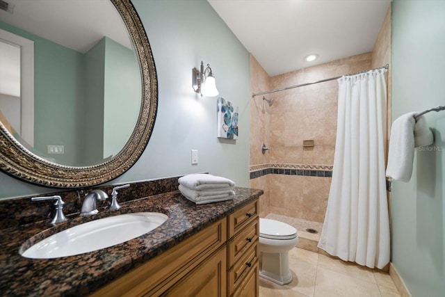 202 Windward Psge Unit 304, Clearwater Beach, FL 33767 - full bath with vanity, a tile shower, and tile patterned flooring