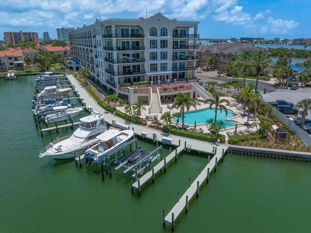 202 Windward Psge Unit 304, Clearwater Beach, FL 33767 - bird's eye view of a large body of water and a pool area