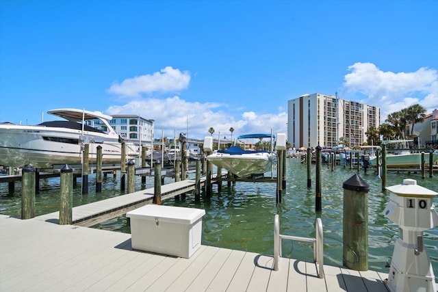 202 Windward Psge Unit 304, Clearwater Beach, FL 33767 - dock featuring boat lift and a water view