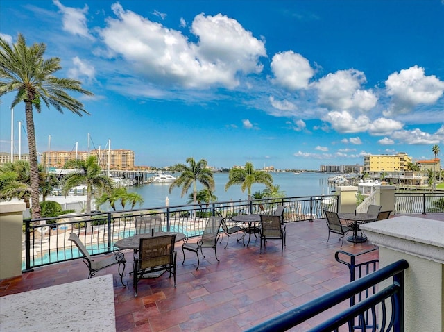 202 Windward Psge Unit 304, Clearwater Beach, FL 33767 - wooden deck with a water view