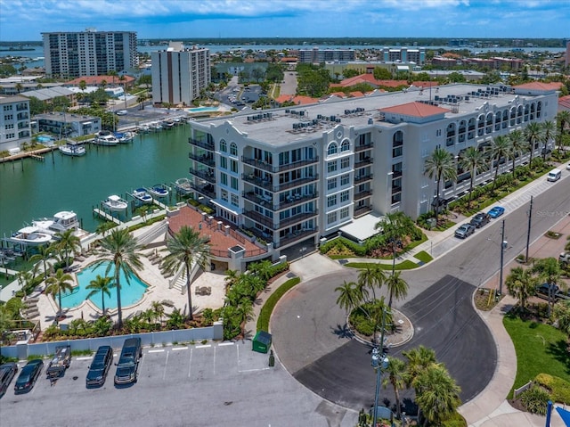 202 Windward Psge Unit 304, Clearwater Beach, FL 33767 - drone / aerial view of apartment complex and a large body of water