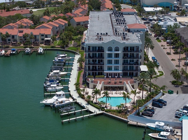 202 Windward Psge Unit 304, Clearwater Beach, FL 33767 - drone / aerial view of a nearby body of water and a pool