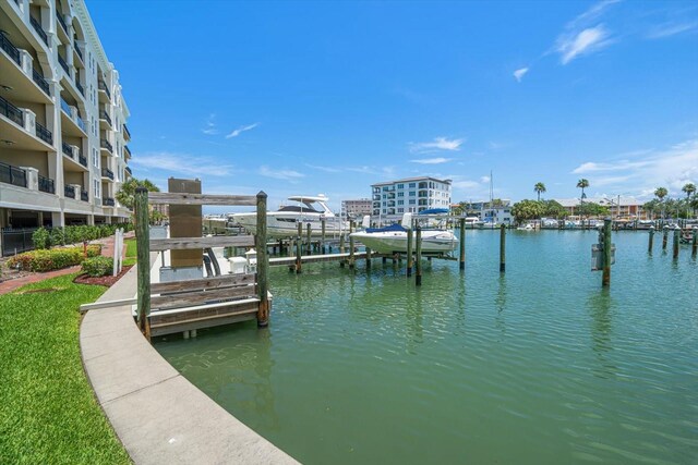 202 Windward Psge Unit 304, Clearwater Beach, FL 33767 - dock area with boat lift and a water view