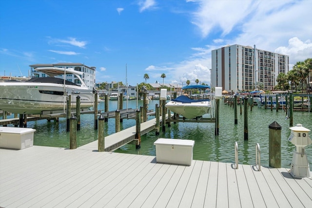 202 Windward Psge Unit 304, Clearwater Beach, FL 33767 - dock with boat lift and a water view