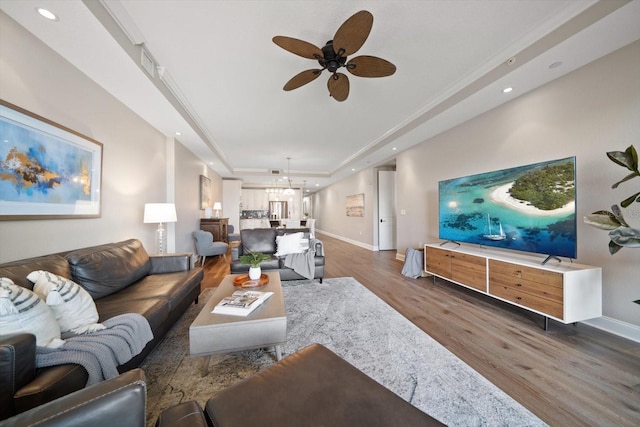 202 Windward Psge Unit 304, Clearwater Beach, FL 33767 - living room featuring wood finished floors, a raised ceiling, ceiling fan, and recessed lighting