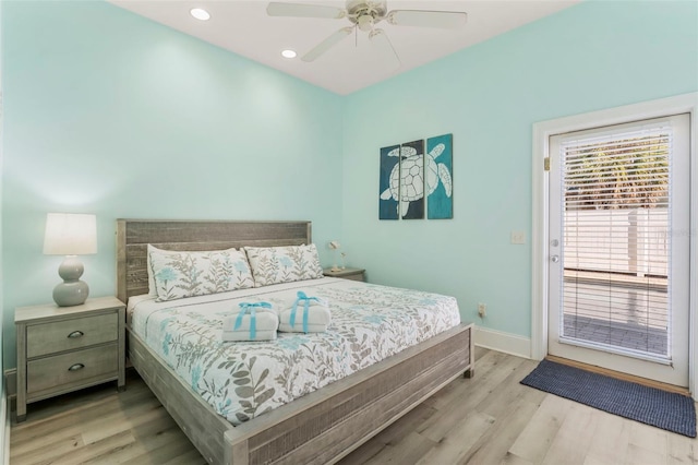 bedroom featuring recessed lighting, wood finished floors, access to exterior, ceiling fan, and baseboards