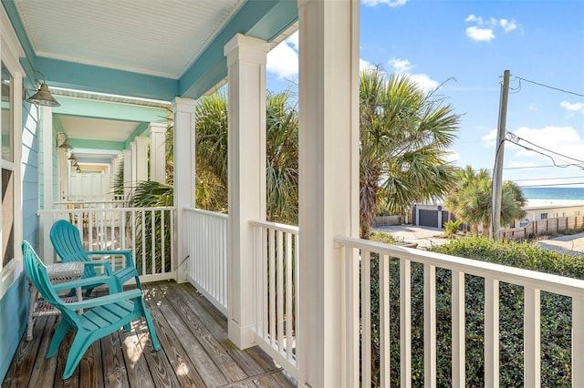 balcony featuring a porch