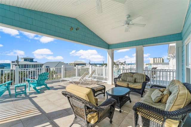 view of patio with ceiling fan and an outdoor living space
