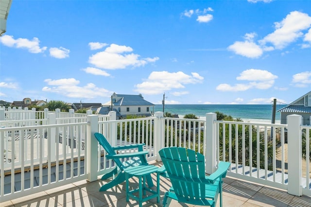 wooden terrace with a water view
