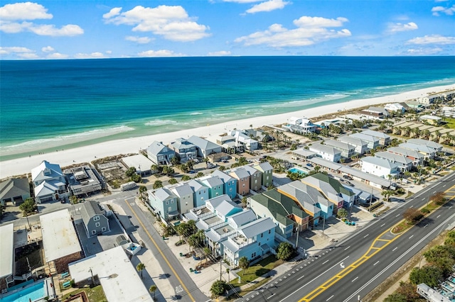 bird's eye view with a beach view, a residential view, and a water view