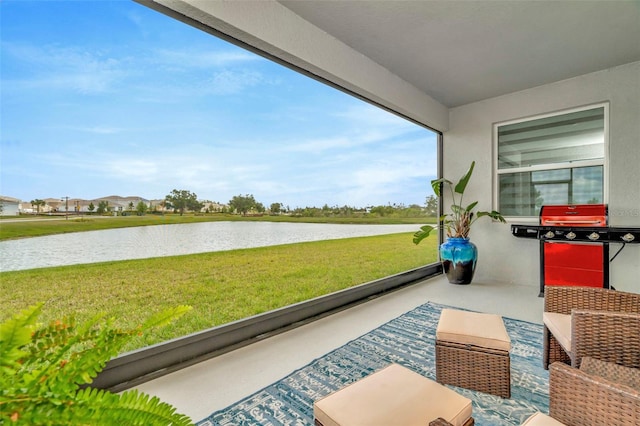 3504 Golden Wheat Ln, Plant City, FL 33565 - sunroom / solarium featuring a water view