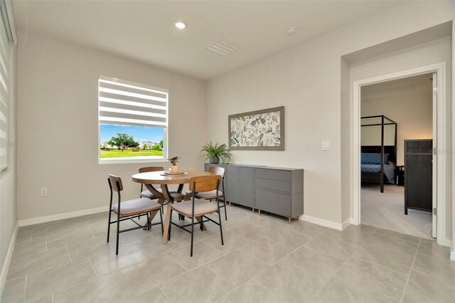 3504 Golden Wheat Ln, Plant City, FL 33565 - dining area with baseboards, recessed lighting, and light tile patterned flooring