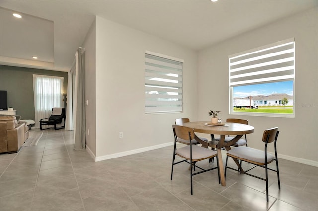3504 Golden Wheat Ln, Plant City, FL 33565 - dining space with healthy amount of natural light, baseboards, recessed lighting, and light tile patterned floors