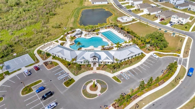 3504 Golden Wheat Ln, Plant City, FL 33565 - drone / aerial view of a pool area and a nearby body of water