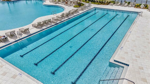 3504 Golden Wheat Ln, Plant City, FL 33565 - community pool featuring a patio area