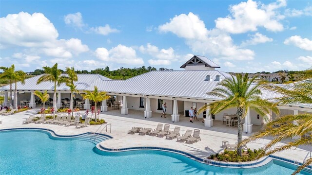 3504 Golden Wheat Ln, Plant City, FL 33565 - community pool featuring a patio area
