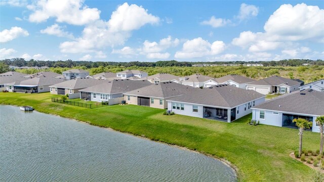 3504 Golden Wheat Ln, Plant City, FL 33565 - aerial view of residential area with a large body of water