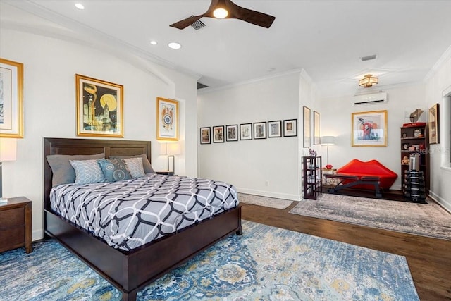 bedroom featuring recessed lighting, wood finished floors, ornamental molding, baseboards, and a wall mounted AC