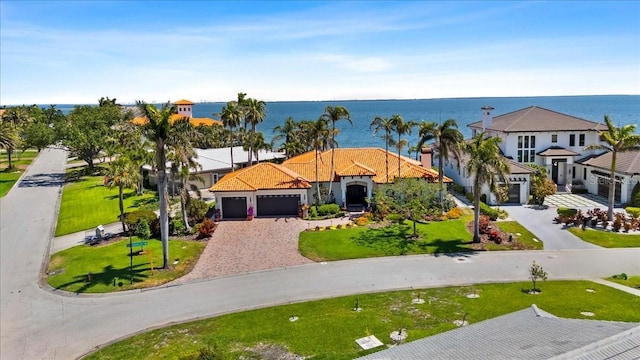 bird's eye view with a water view