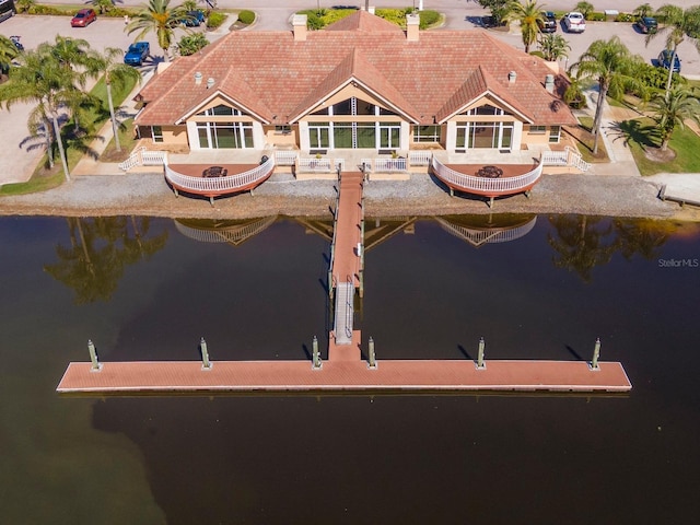dock area featuring a water view