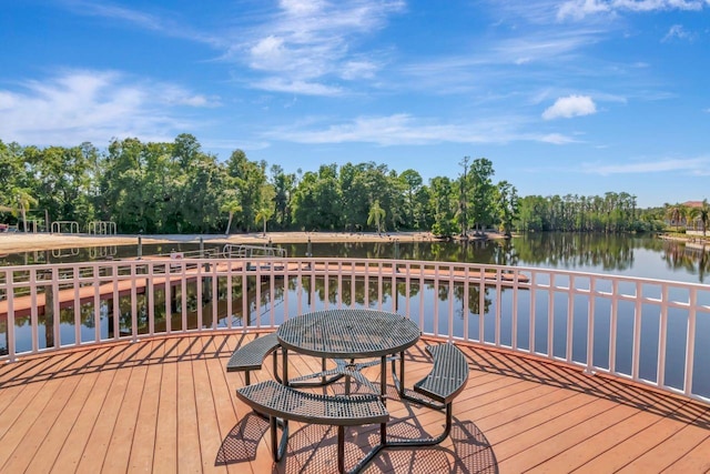 wooden terrace with a water view