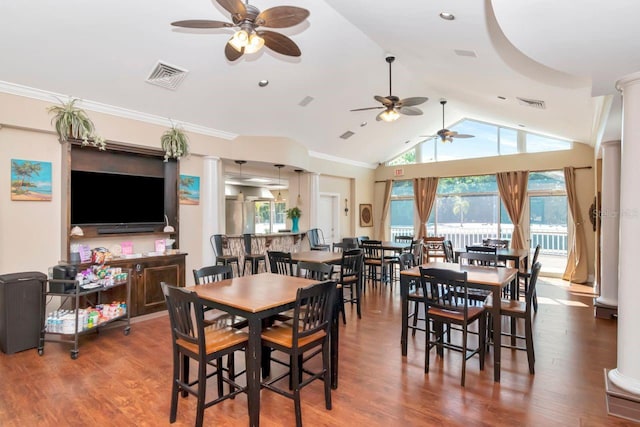 dining area featuring a ceiling fan, visible vents, and lofted ceiling