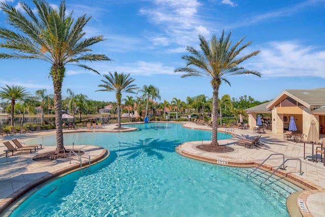 pool featuring a patio area