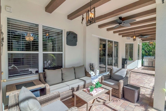 view of patio featuring a ceiling fan and outdoor lounge area