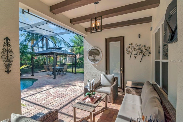 view of patio / terrace featuring outdoor dining space, an outdoor hangout area, glass enclosure, and an outdoor pool