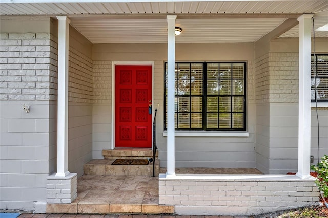 entrance to property with a porch