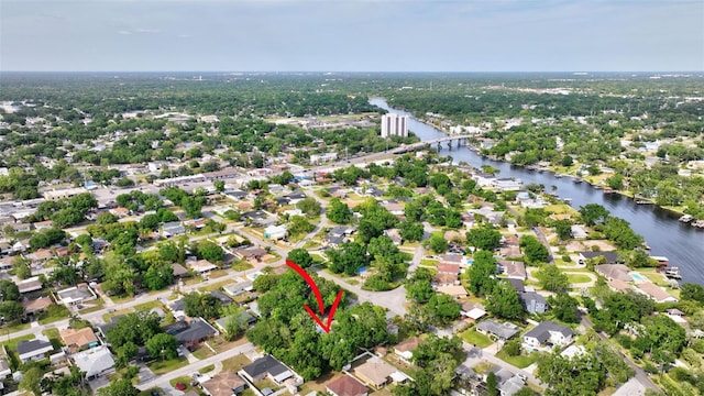 bird's eye view with a residential view and a water view