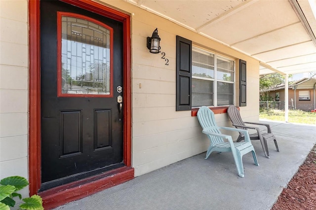 entrance to property with covered porch