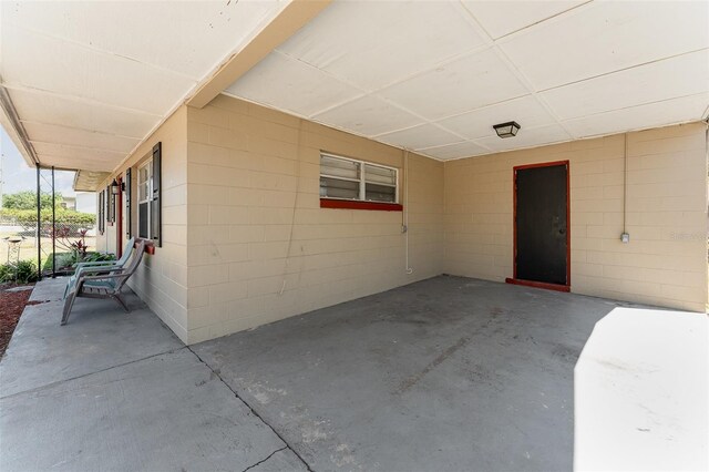 view of patio / terrace featuring a carport