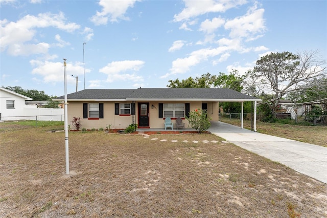 222 Aldo Dr, Babson Park, FL 33827 - single story home with driveway, a carport, covered porch, and a shingled roof