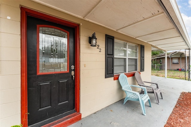 222 Aldo Dr, Babson Park, FL 33827 - view of exterior entry featuring a porch