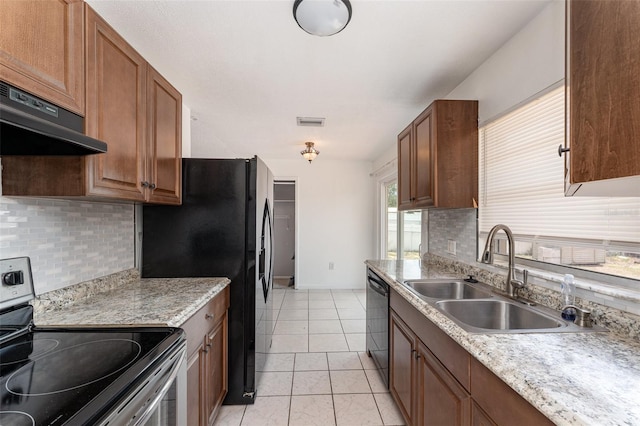 222 Aldo Dr, Babson Park, FL 33827 - kitchen with black appliances, a sink, decorative backsplash, and under cabinet range hood