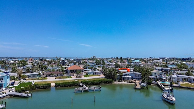 bird's eye view with a water view and a residential view