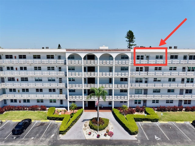 5501 80th St N Unit 509, Saint Petersburg, FL 33709 - view of apartment building / complex featuring uncovered parking