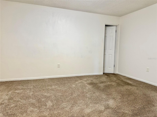 5501 80th St N Unit 509, Saint Petersburg, FL 33709 - spare room featuring carpet floors and a textured ceiling